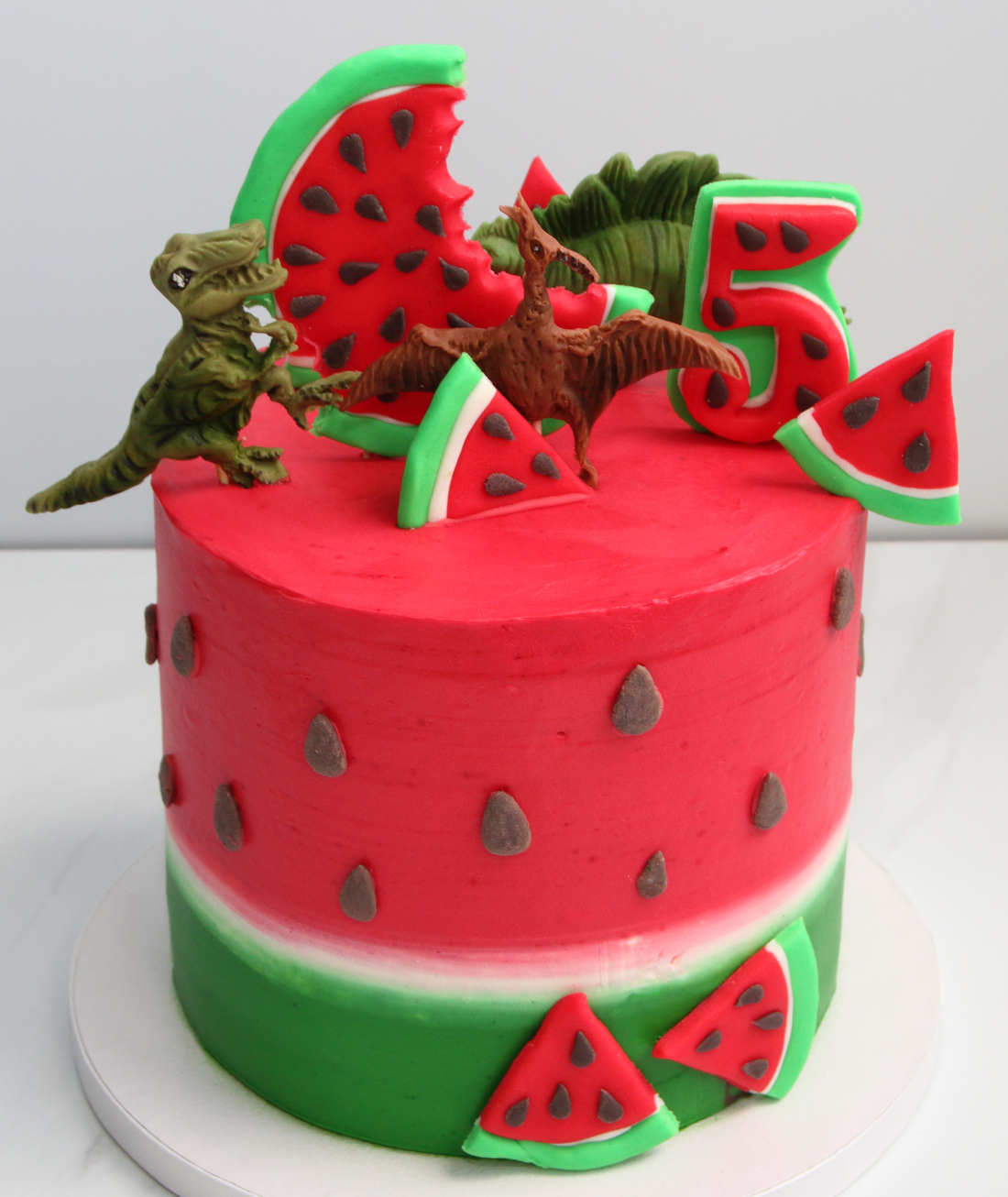 Watermelon cake with dinosaurs for a 5 year old boy