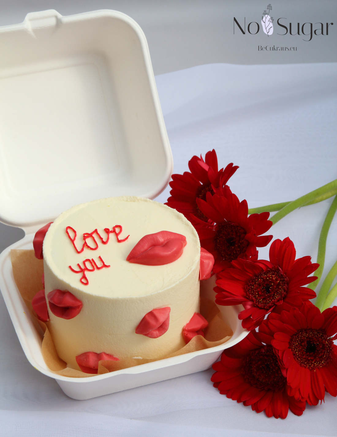 Red chocolate lips on sugar-free bento cake