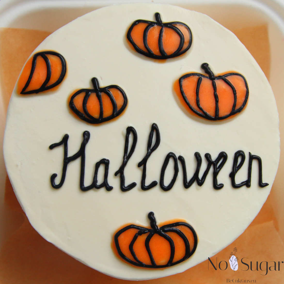 Pumpkins on Halloween cake