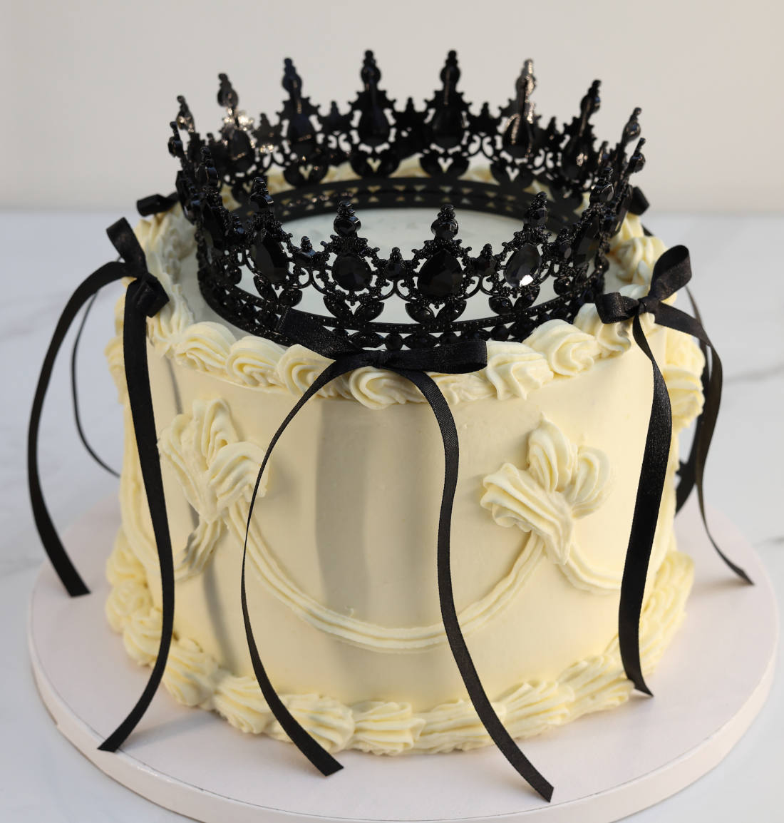 Cake with ribbons and the crown