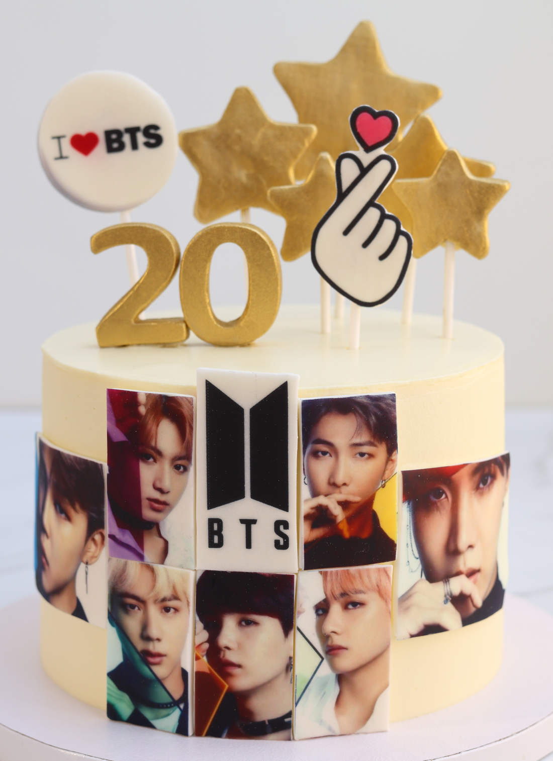 Cake with photos of BTS members