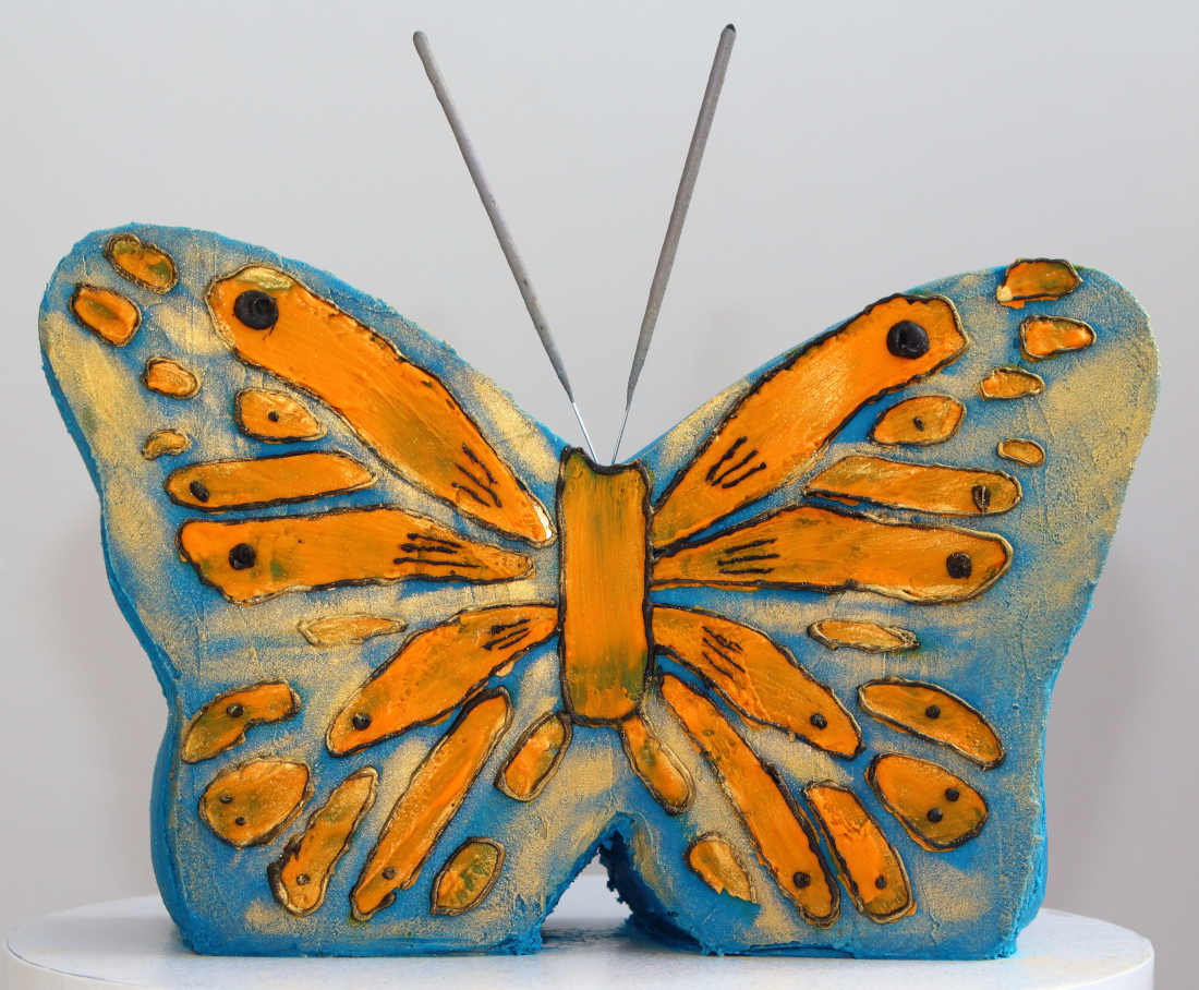 Sparklers on a butterfly cake