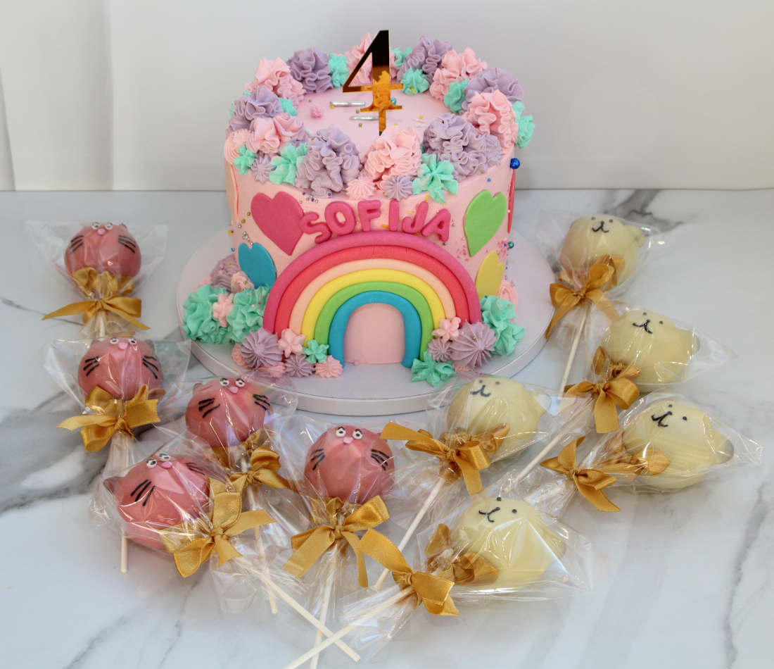 Cake pops and cake with rainbow