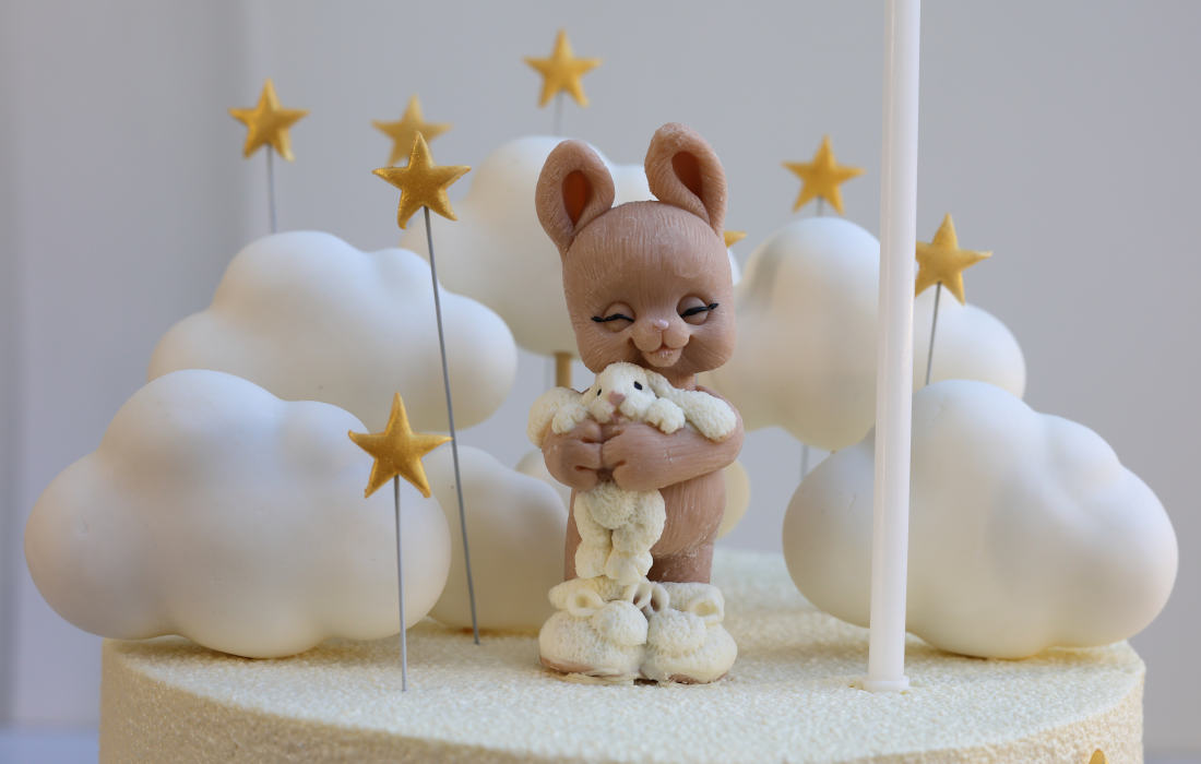 Chocolate bunny on a girl's birthday cake