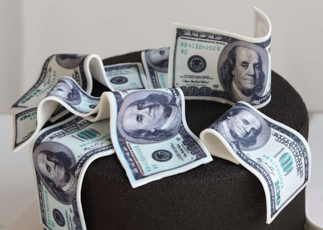 Dollars on the birthday cake