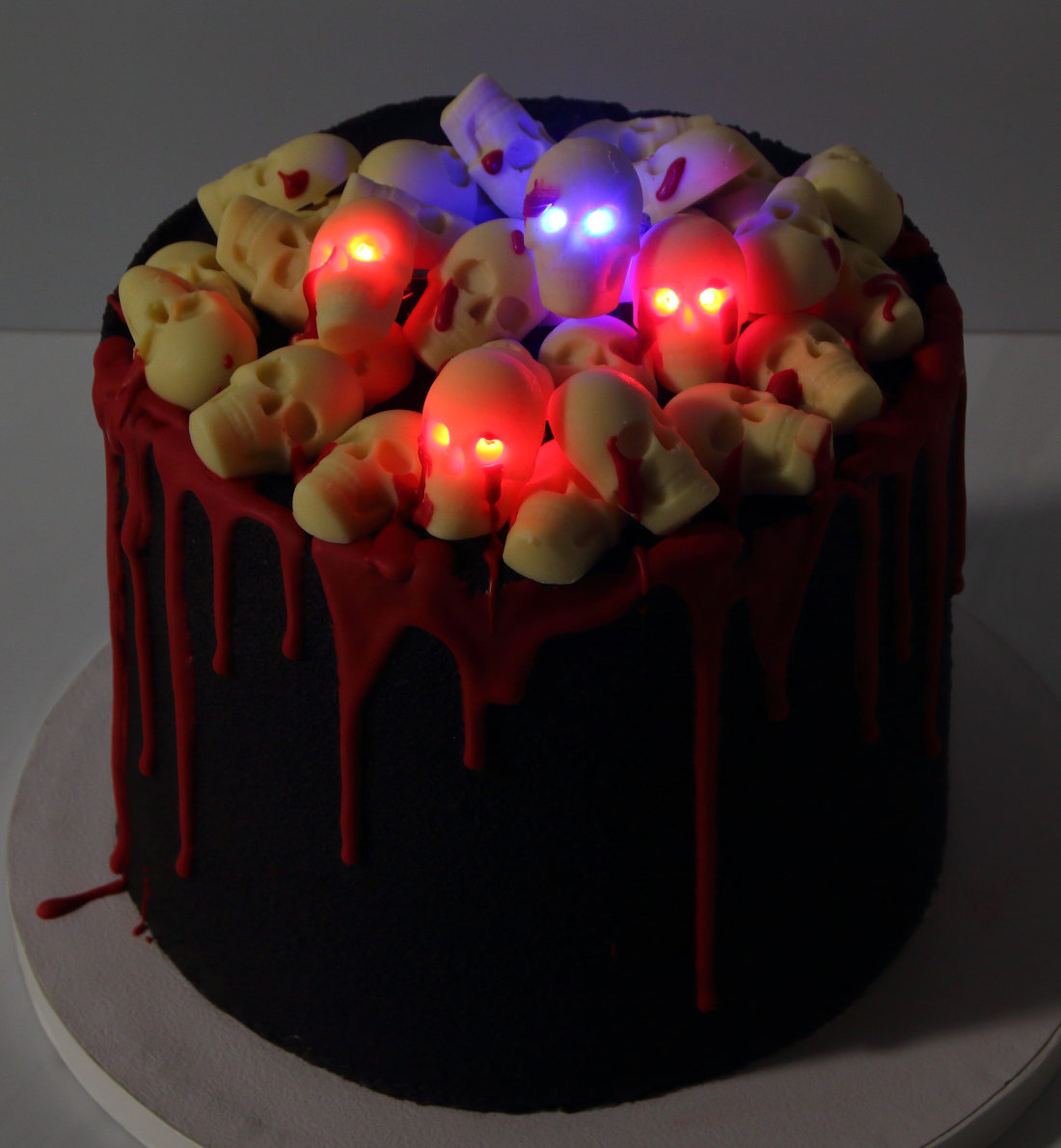 Halloween cake with LEDs and skulls