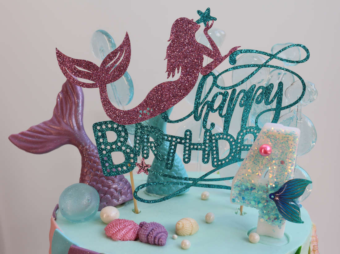 Mermaid cake topper for 4 year old girl's birthday