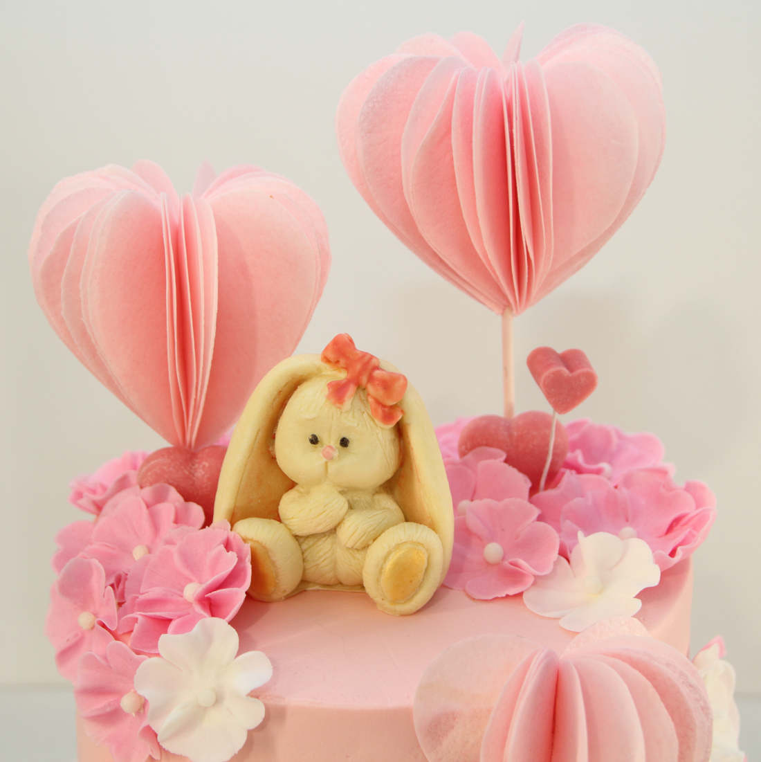 Hare, flowers and heart-shaped air balloons