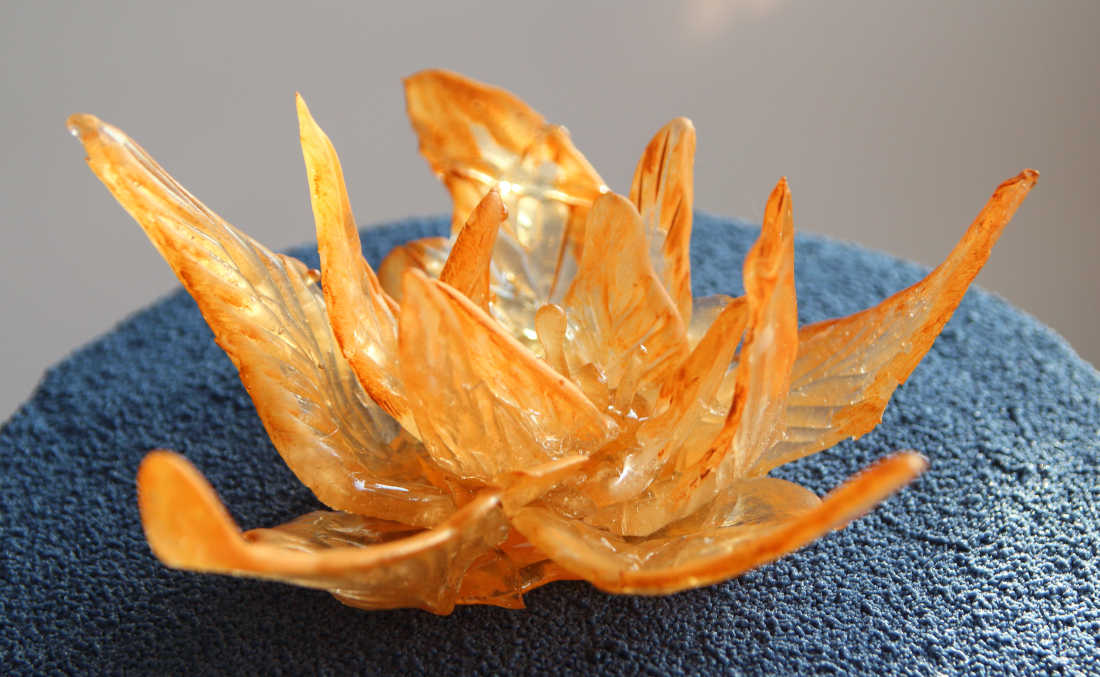 Isomalt flower on chocolate velor