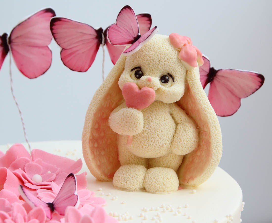 Chocolate bunny surrounded by butterflies