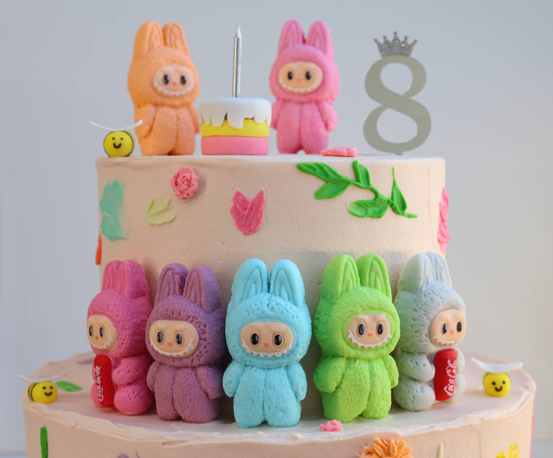 Colorful Labubus on the cake