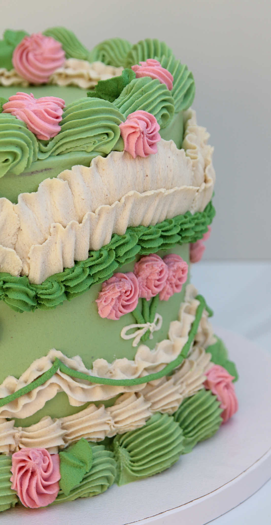 Cream roses on vegan cake