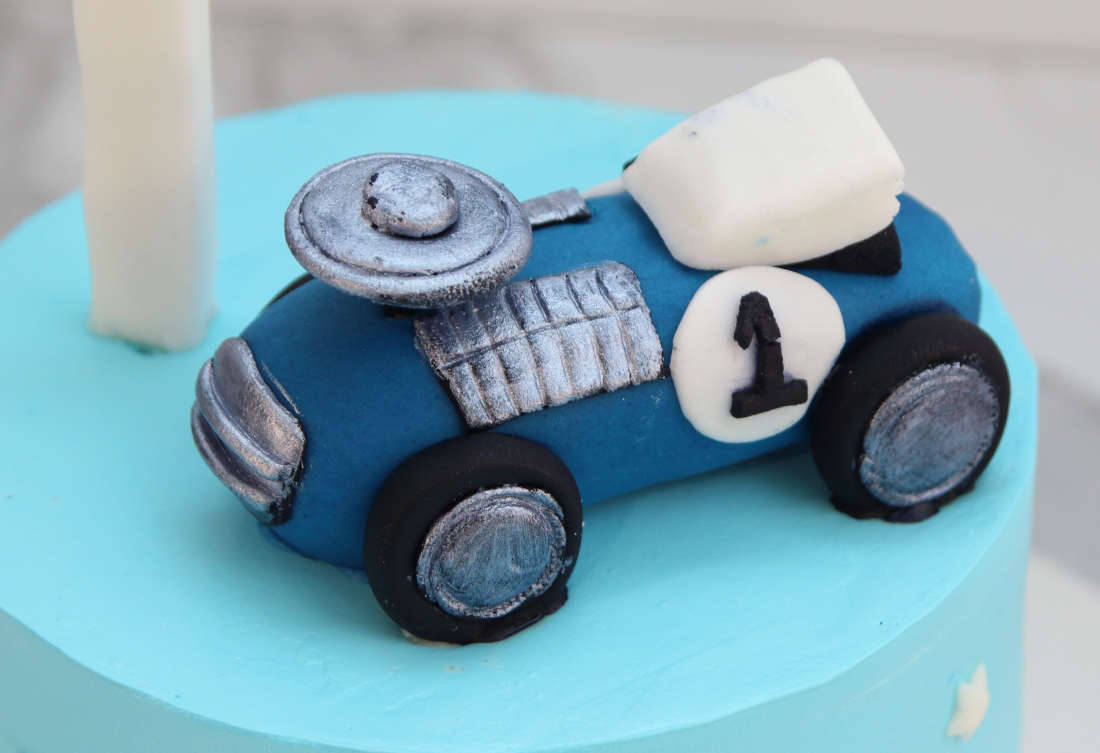 Racing car on a cake for boy
