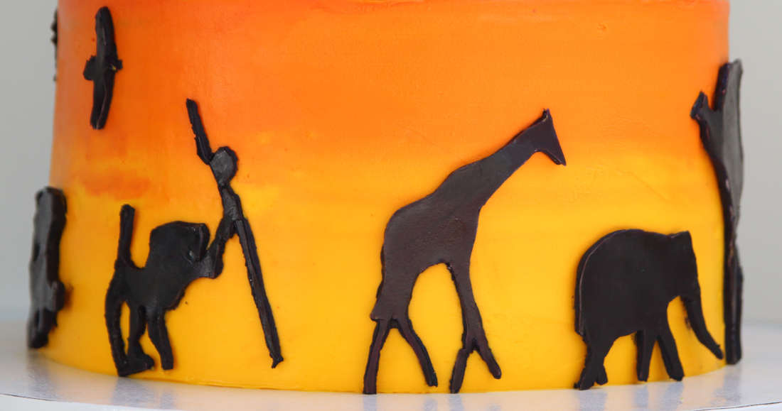 Lion King cartoon characters on the cake