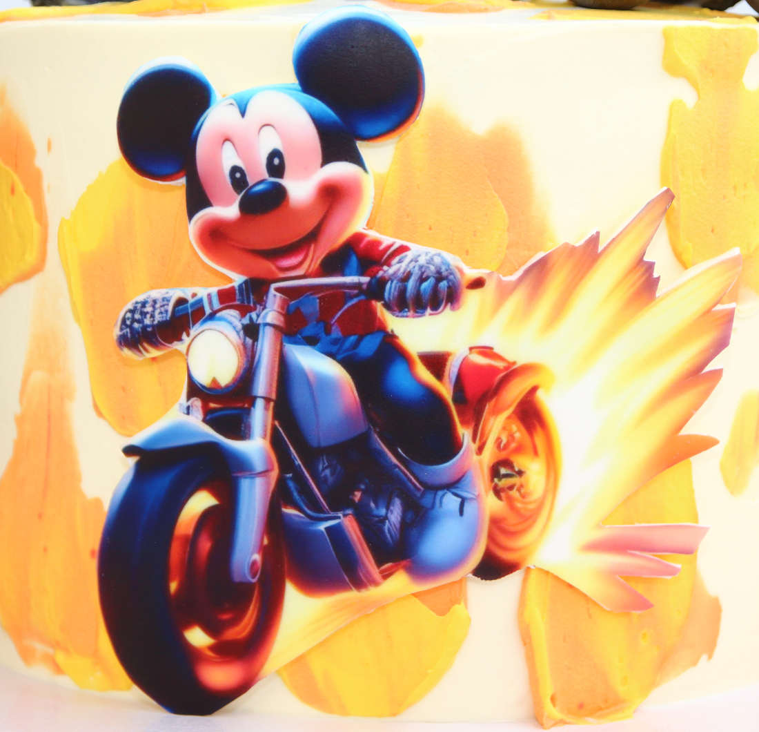 Mickey Mouse on a motorcycle - edible print