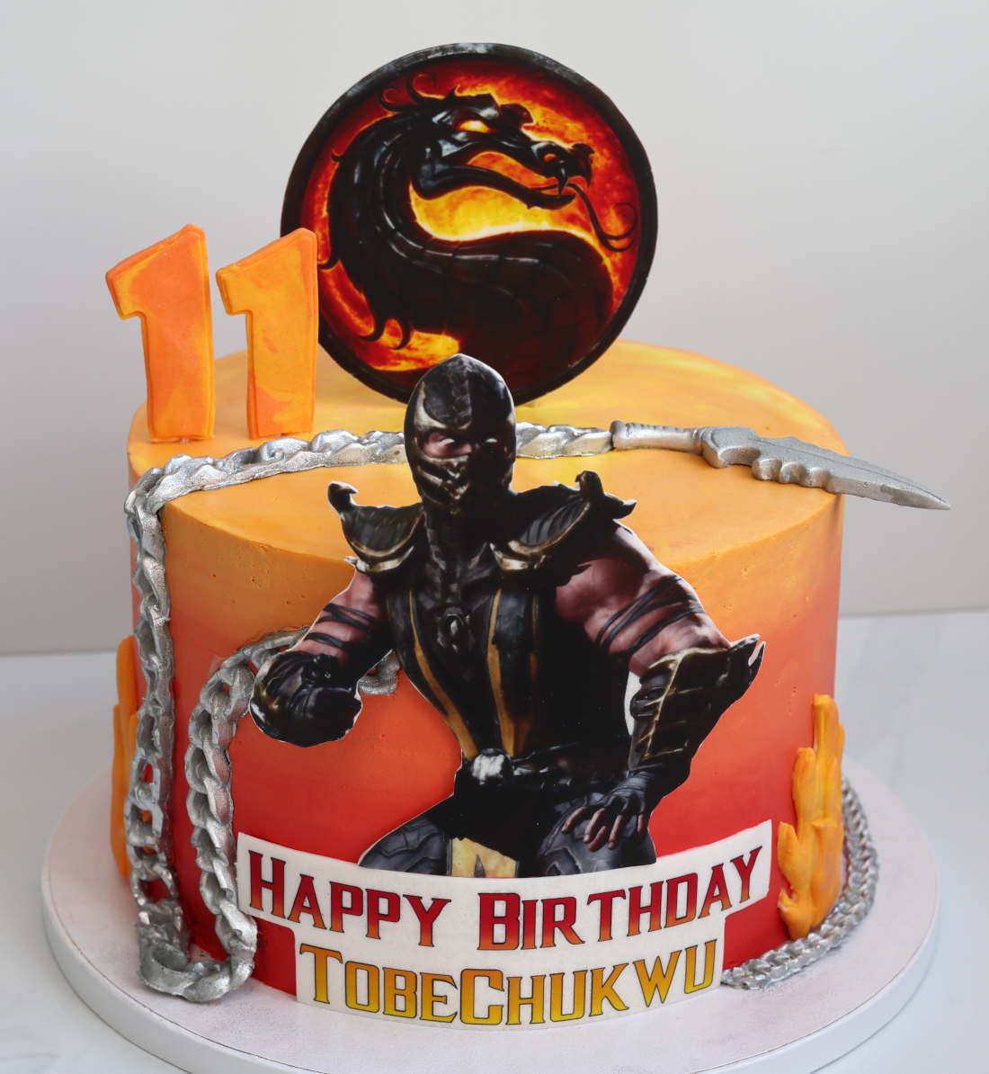 Cake with Mortal Kombat-style inscription