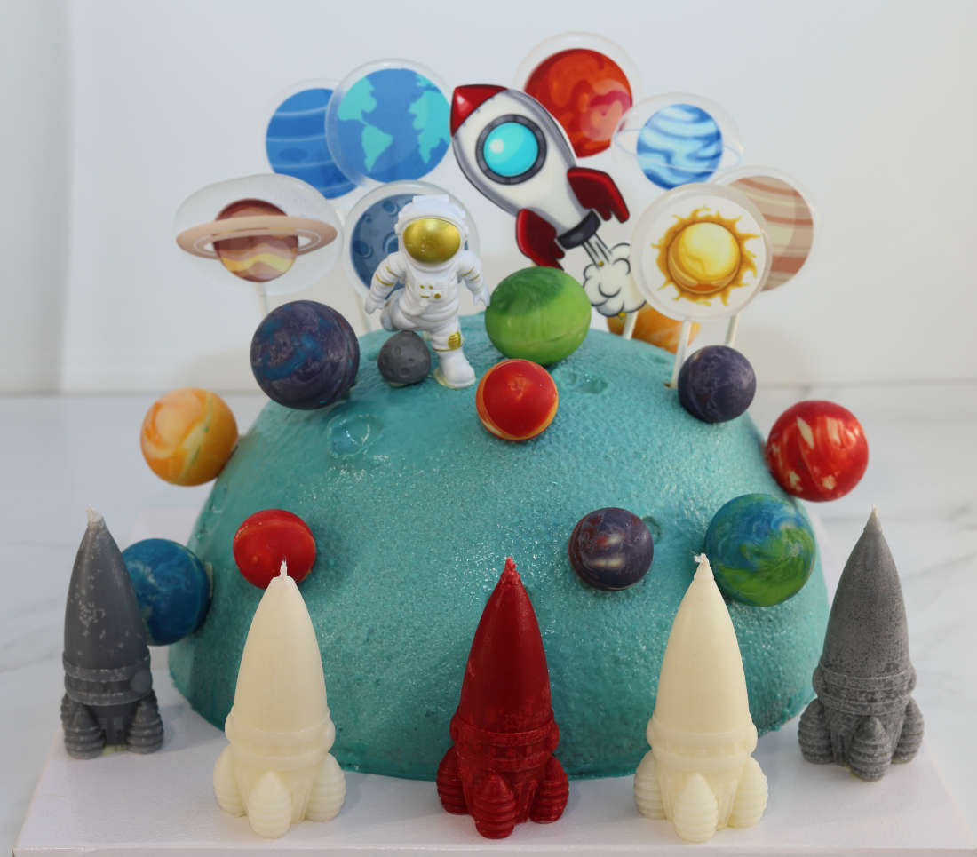 Cosmonaut surrounded by planets and rockets