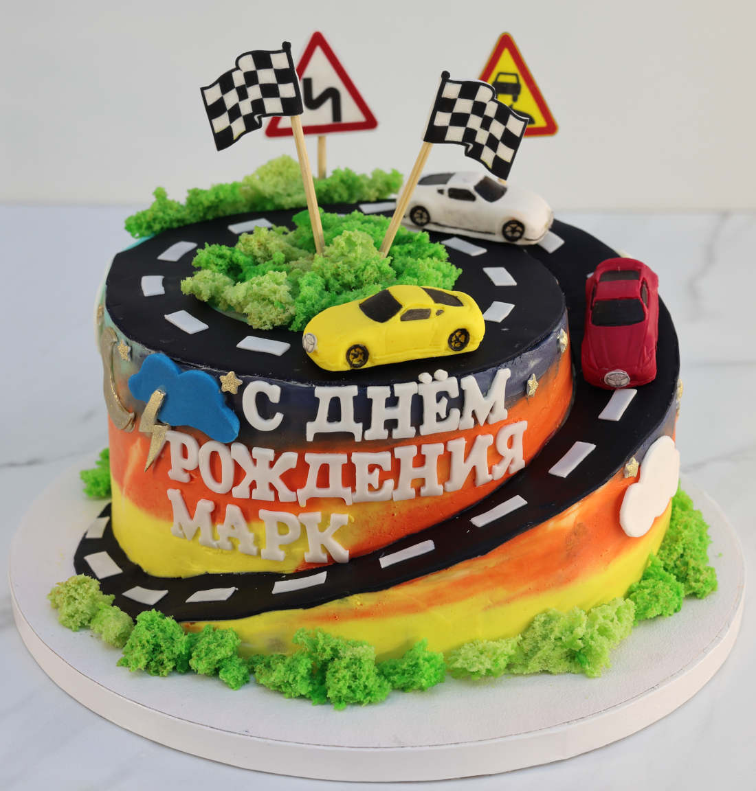 Road around the cake with cars