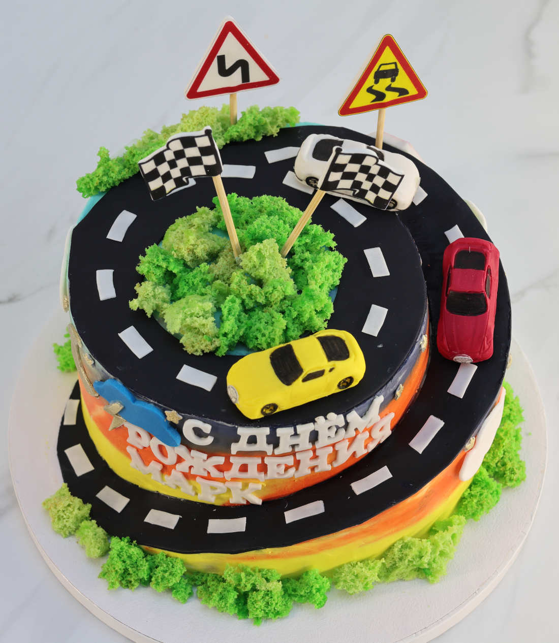 Birthday cake with a road and cars