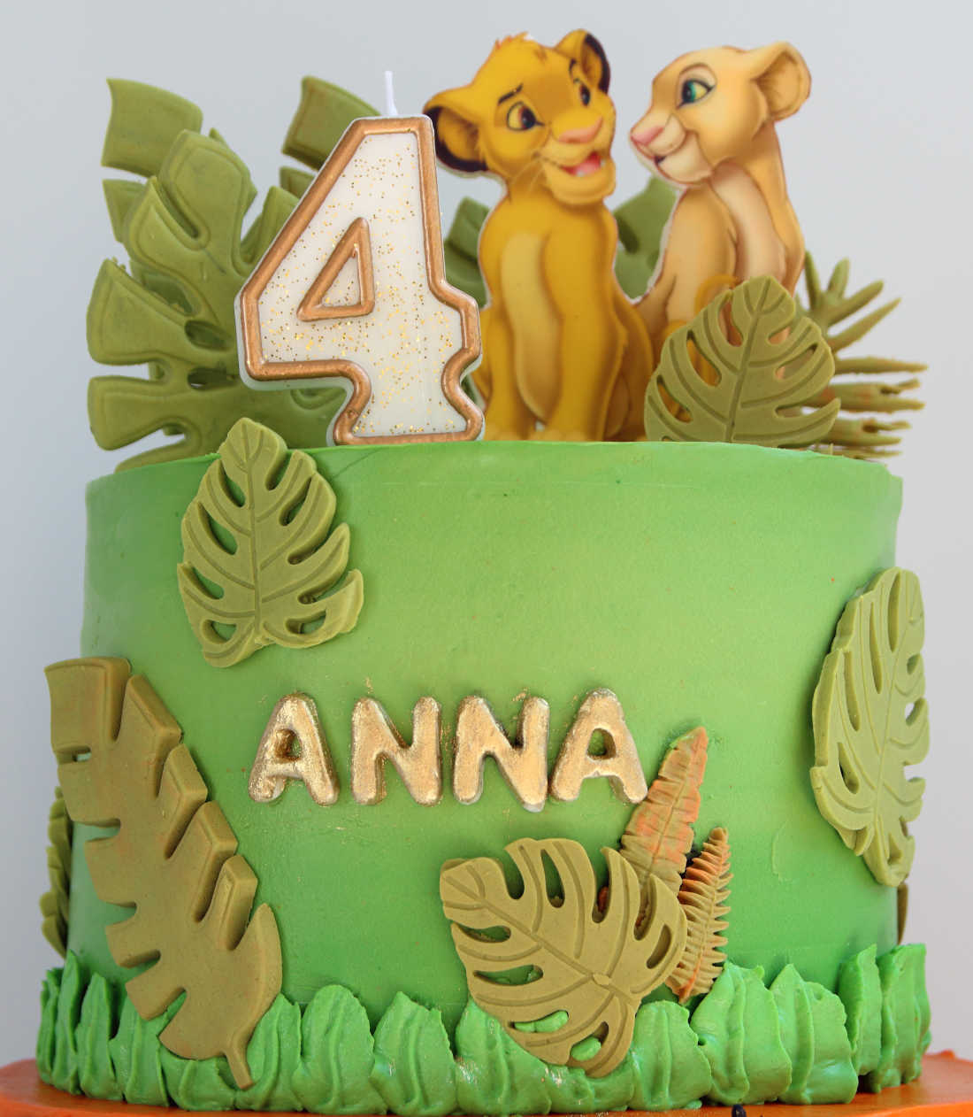 Simba and Nala on the birthday cake