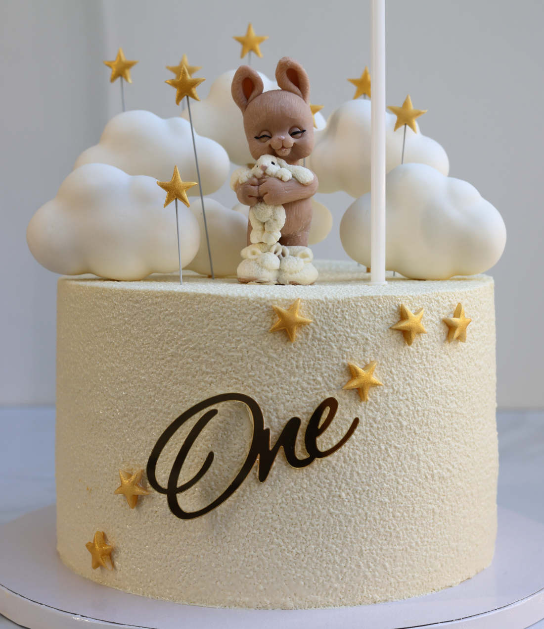 Bunny and clouds cake for a first birthday