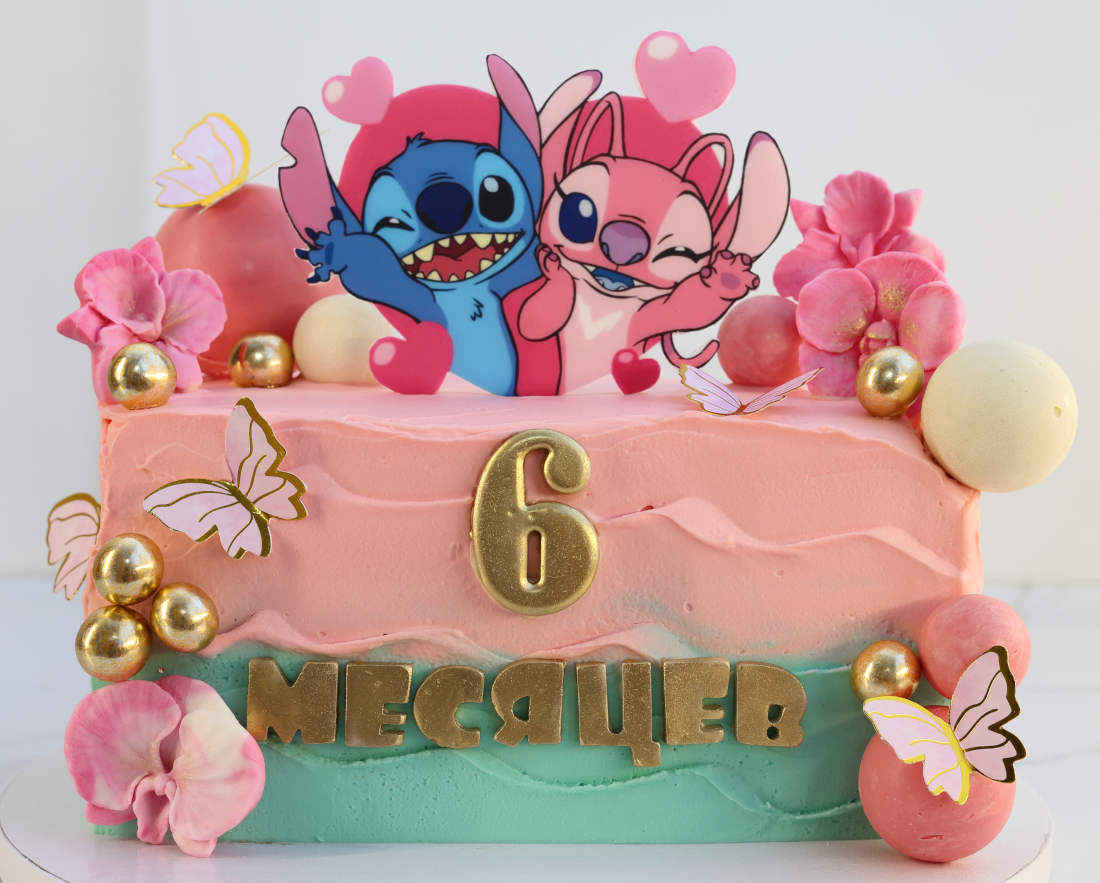 Angel and Stitch from the cartoon on a 6-month birthday cake