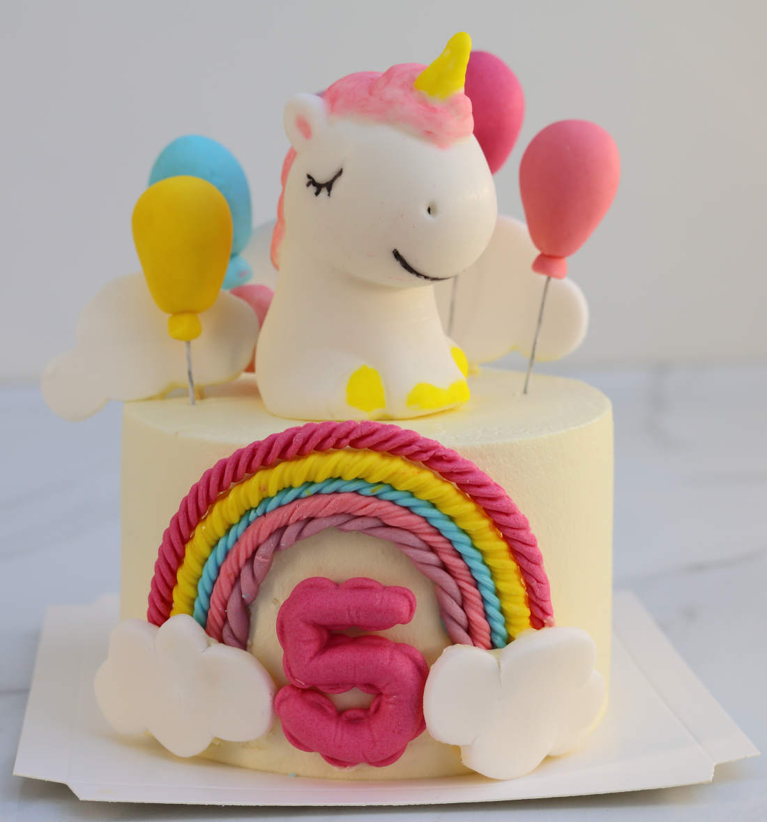 Bento cake with unicorn and balloons for a 5-year-old
