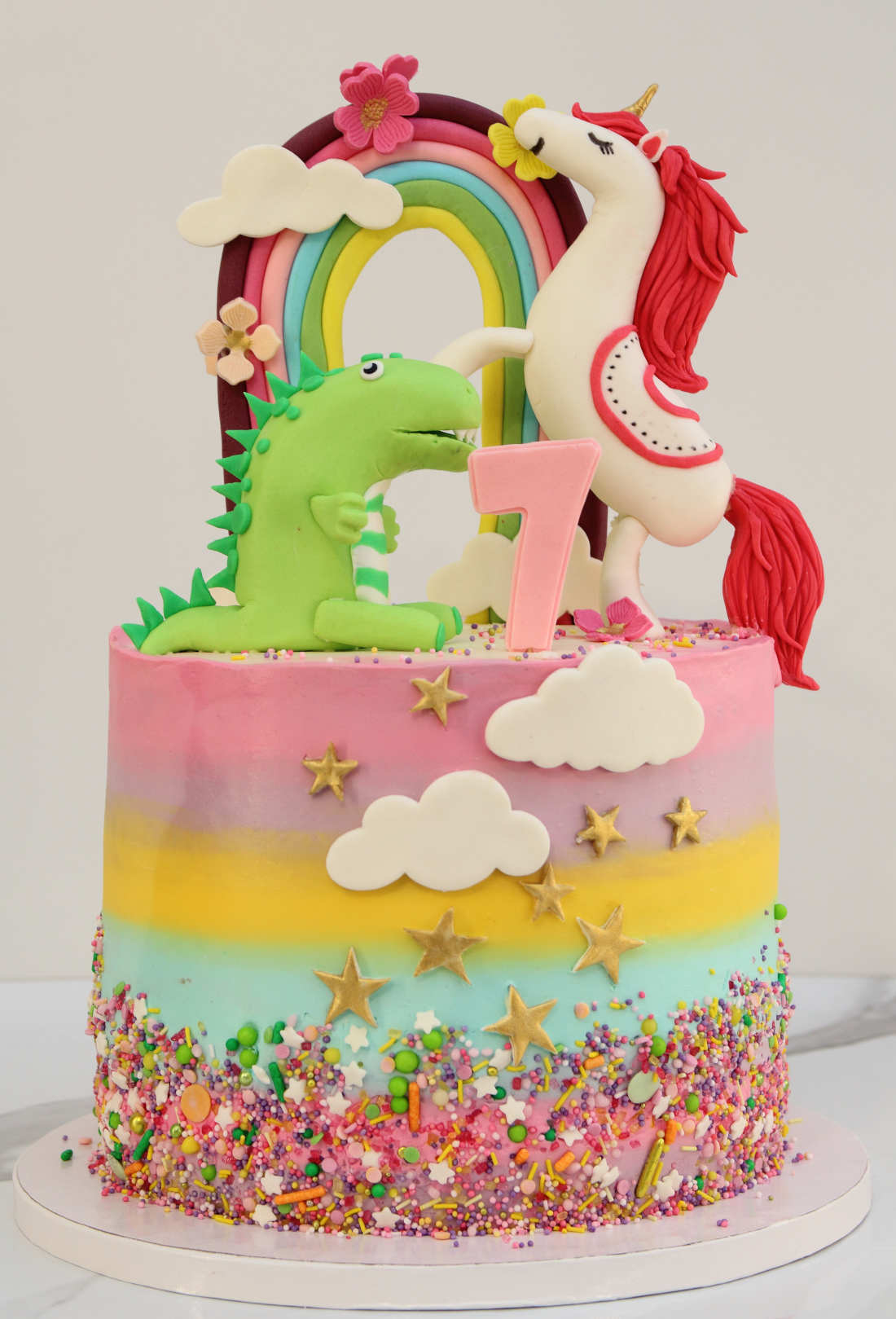 Cake with unicorn and rainbow for a girl